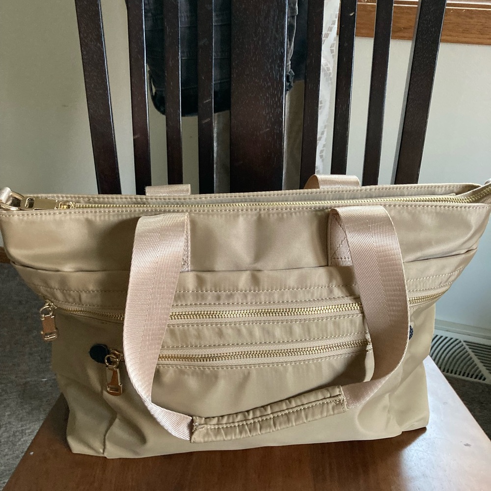 Beige Nylon Tote Bag with Spacious Design and Lots of Pocket.